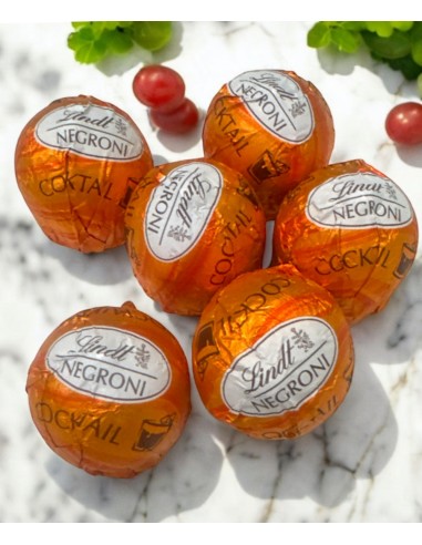 CIOCCOLATINI LINDT PRALINE AL CIOCCOLATO FONDENTE CON RIPIENO NEGRONI 300 GR